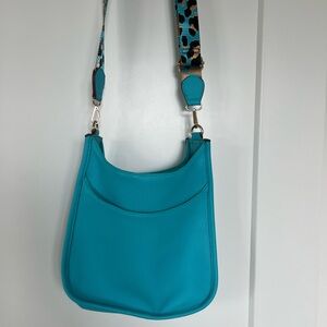 Stylish Blue Leather Shoulder Bag with Leopard printed strap